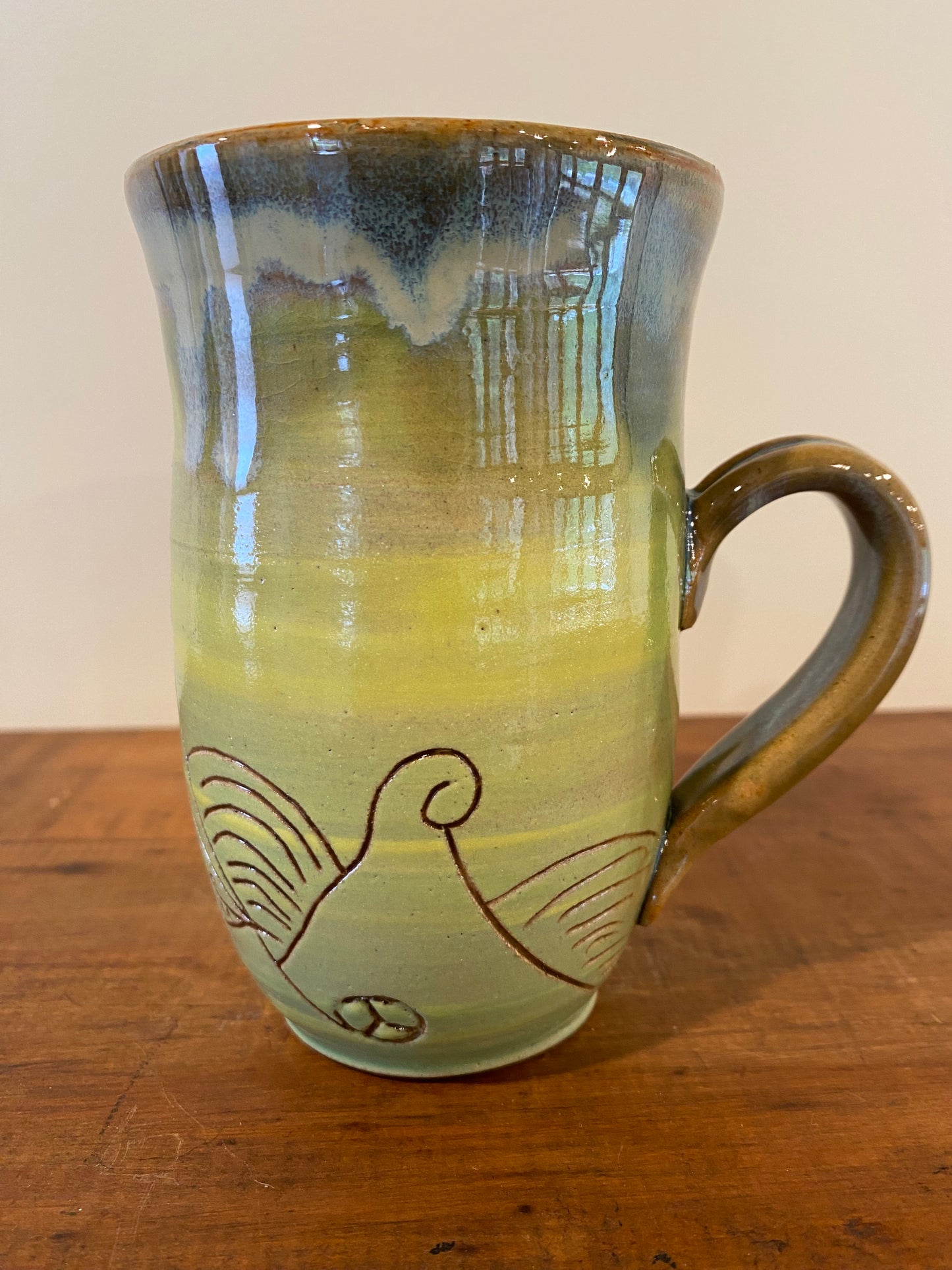 Koru mushroom craved mug green yellow