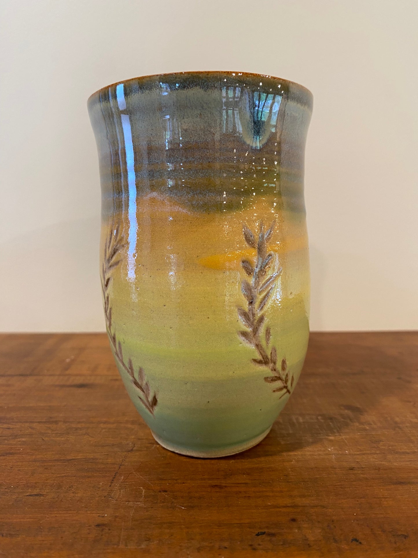 Leaf carved green mug