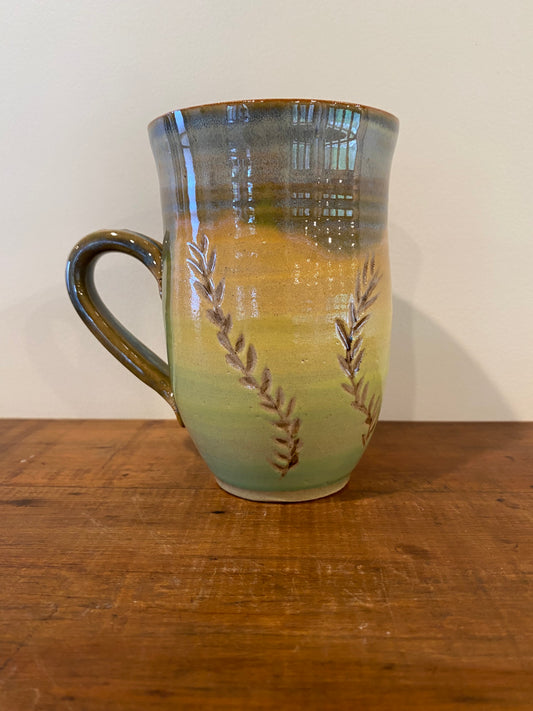 Leaf carved green mug