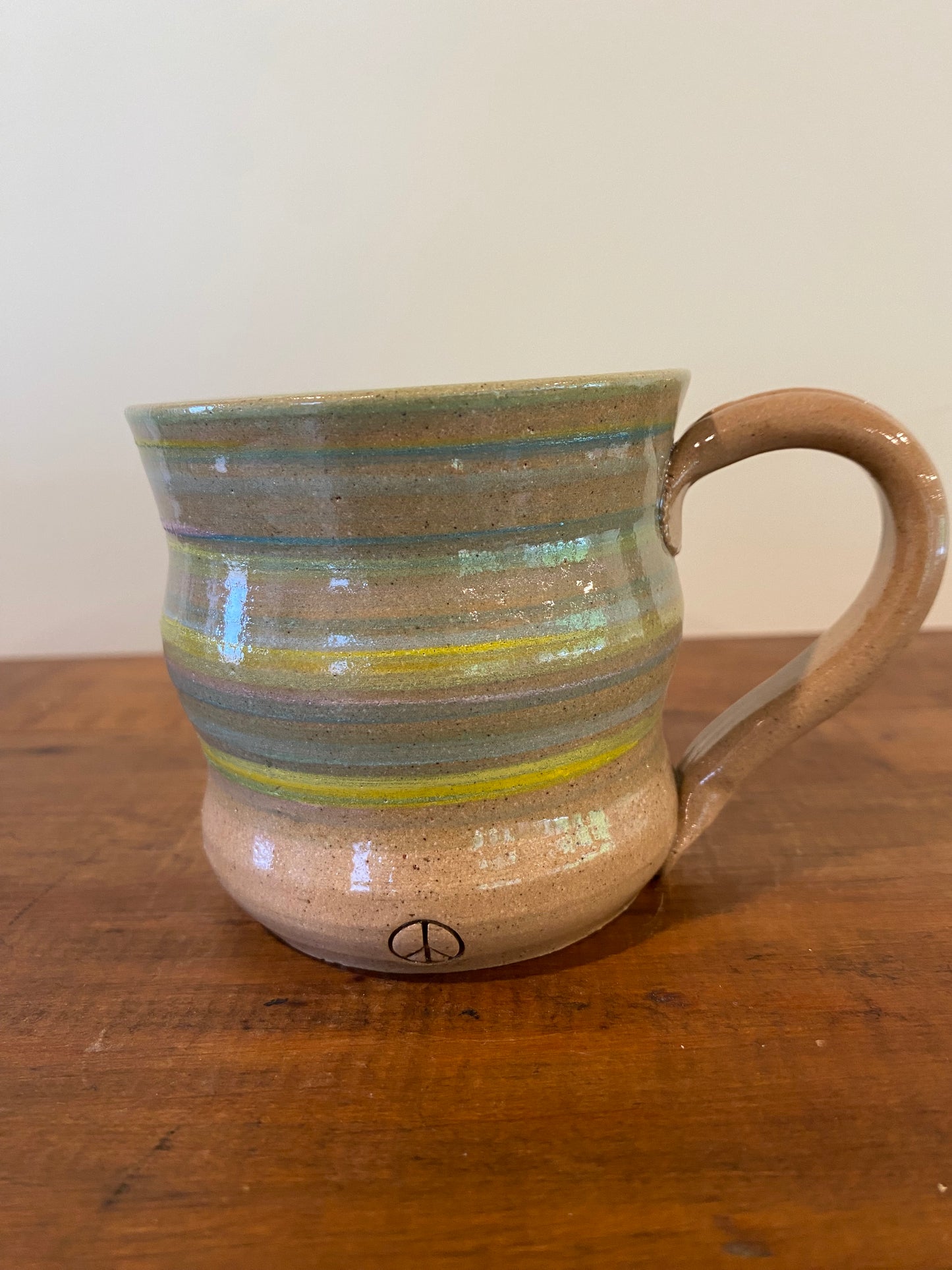 Sunny stripe mug with suprise little C***